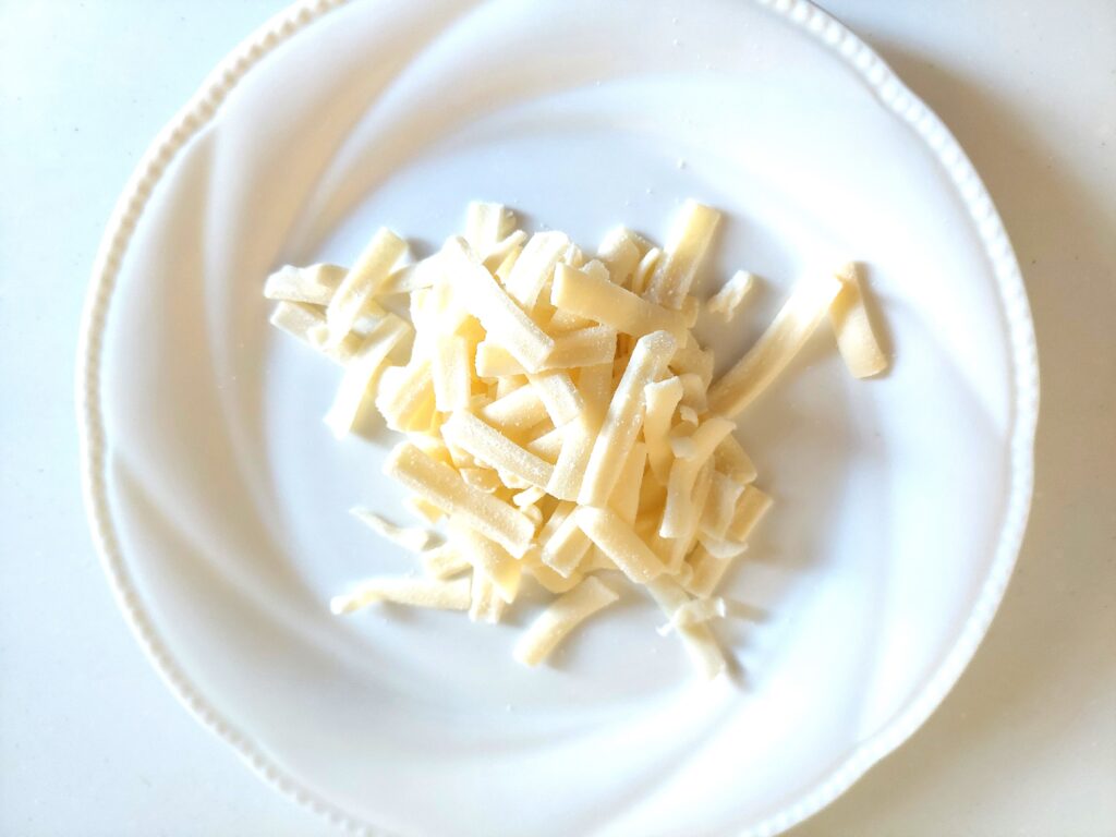 コープ「とろけるゴーダシュレッドチーズ」中身の画像