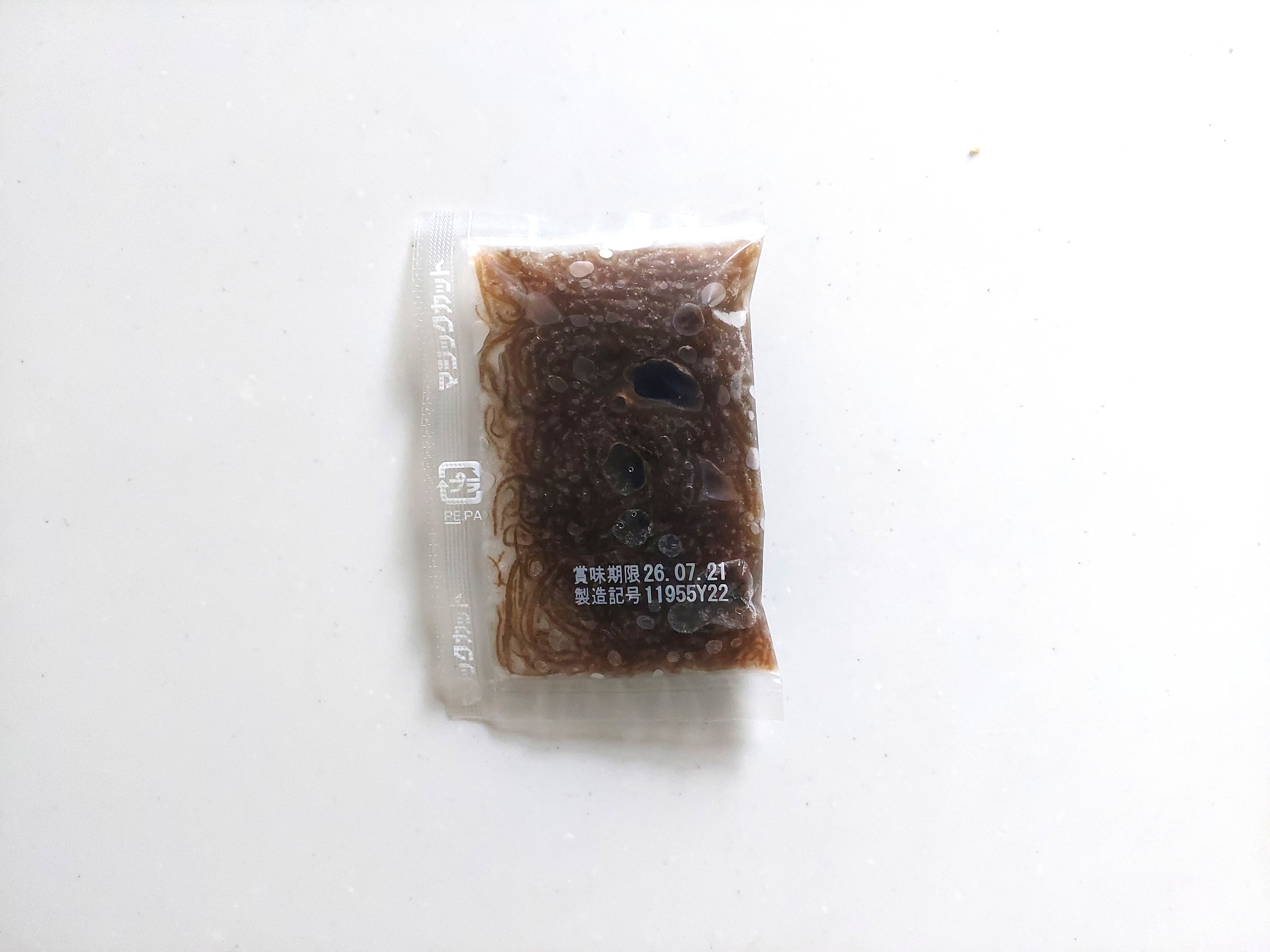 コープ「 産直小分けで使える沖縄県伊平屋島産もずく」1パック裏